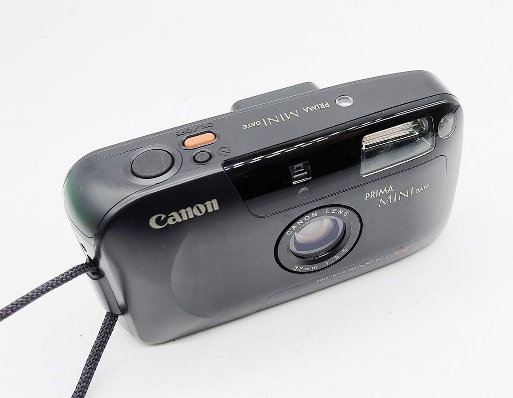 246 - Canon Prima Mini Date + 32/3.5 Objektiv + OVP & Ledertasche