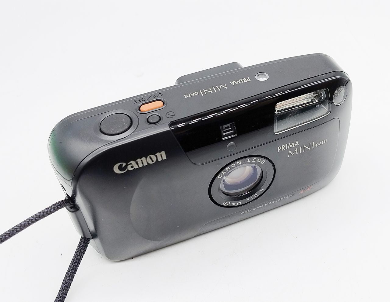 246 - Canon Prima Mini Date + 32/3.5 Objektiv + OVP & Ledertasche
