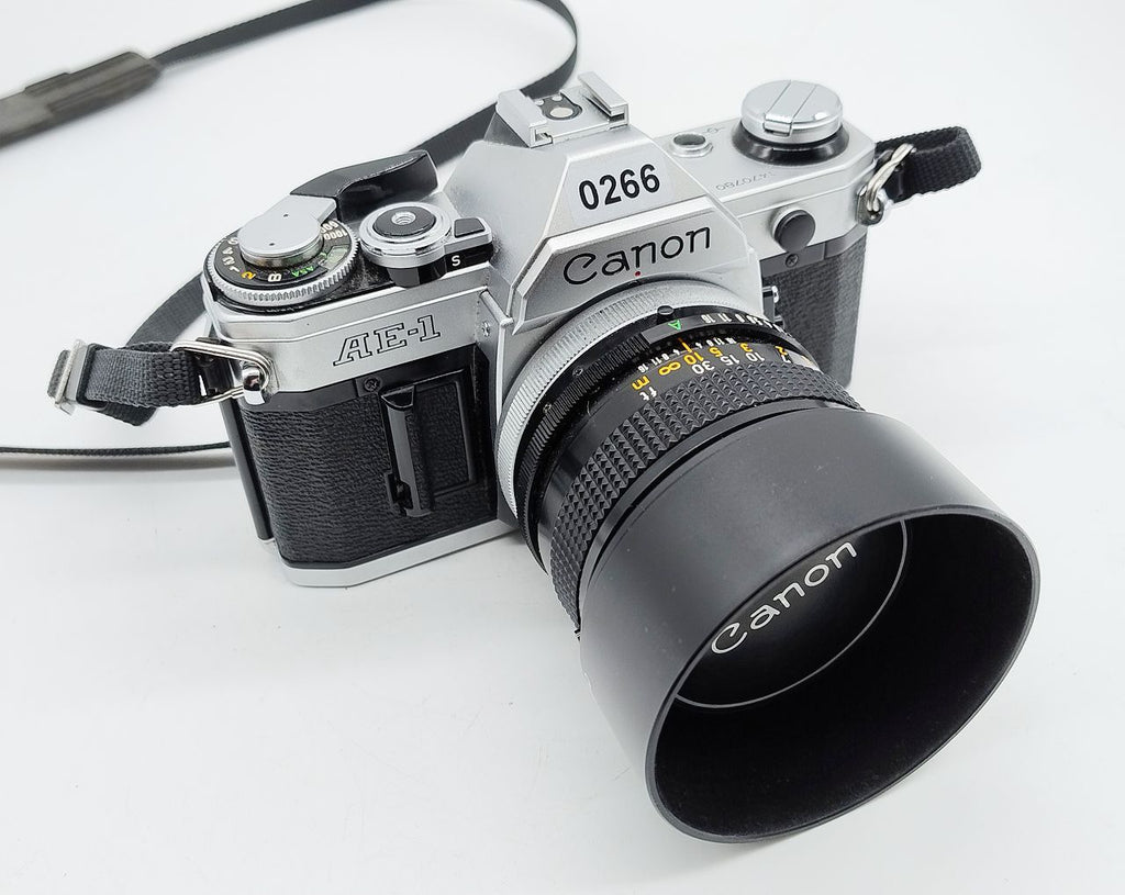 266 - Canon AE1 (läuft) + 50/1.4 FD (sehr schön +  Filter) + Karton + Anleitung