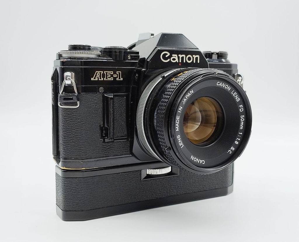 79 - Canon AE1 + Canon 50/1.8 Objektiv (vmtl. Pilz) + Motor Drive A