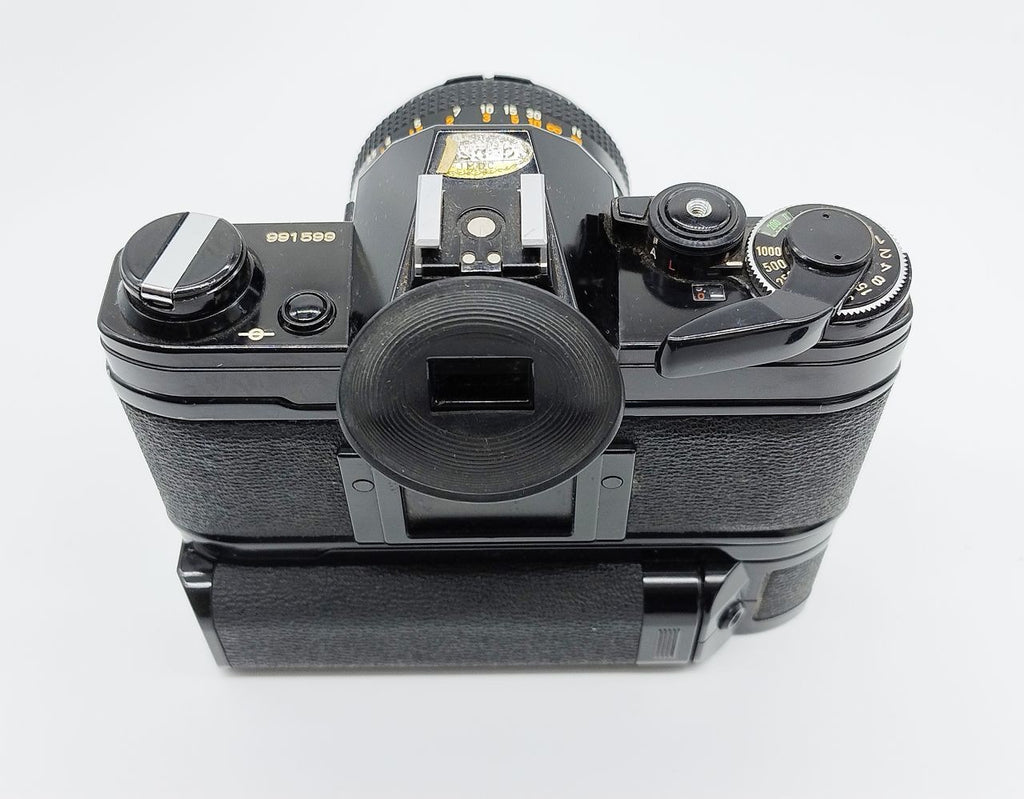79 - Canon AE1 + Canon 50/1.8 Objektiv (vmtl. Pilz) + Motor Drive A