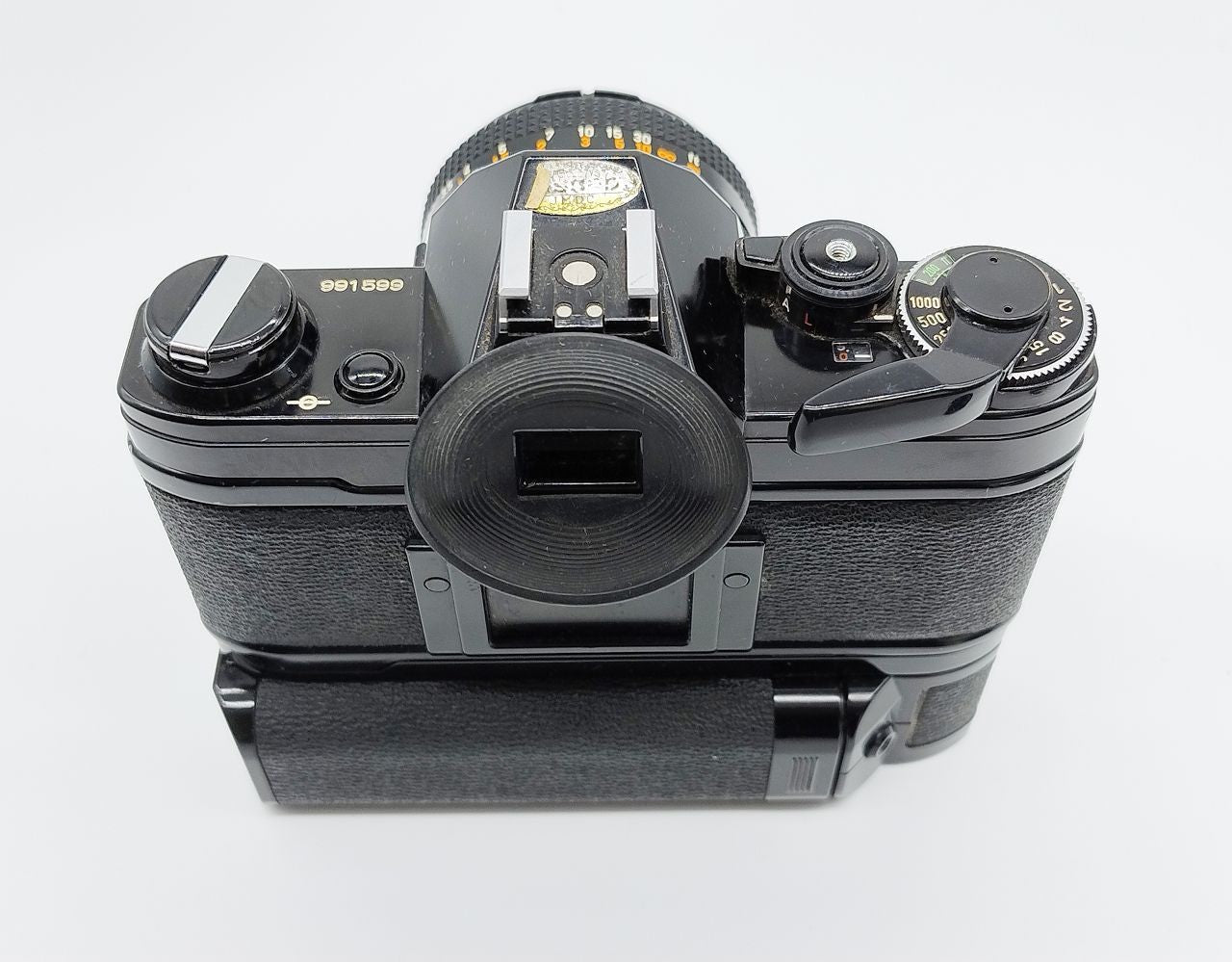 79 - Canon AE1 + Canon 50/1.8 Objektiv (vmtl. Pilz) + Motor Drive A