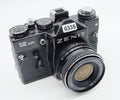 335 - Zenit 12 XP Kamera + Auto Revuenon 28/2.8 Objektiv