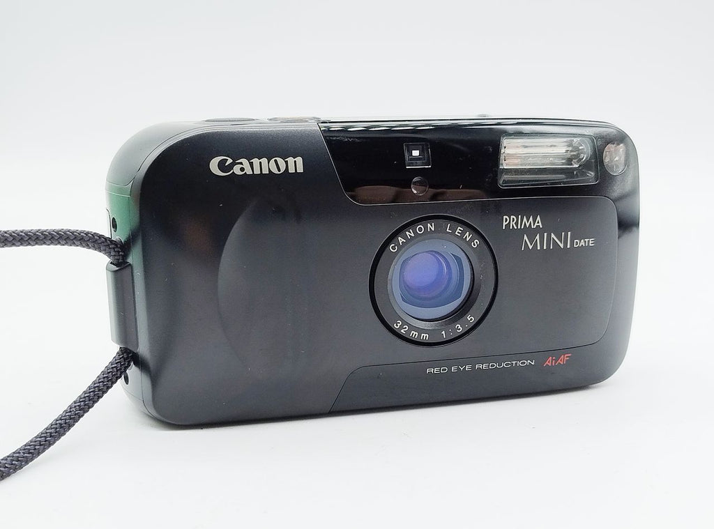246 - Canon Prima Mini Date + 32/3.5 Objektiv + OVP & Ledertasche