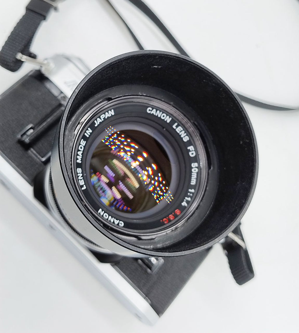 266 - Canon AE1 (läuft) + 50/1.4 FD (sehr schön +  Filter) + Karton + Anleitung