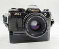 194 - Canon AE1 (schwarz) + FD 50/1.8 + Motor + alles voll funktionsfähig