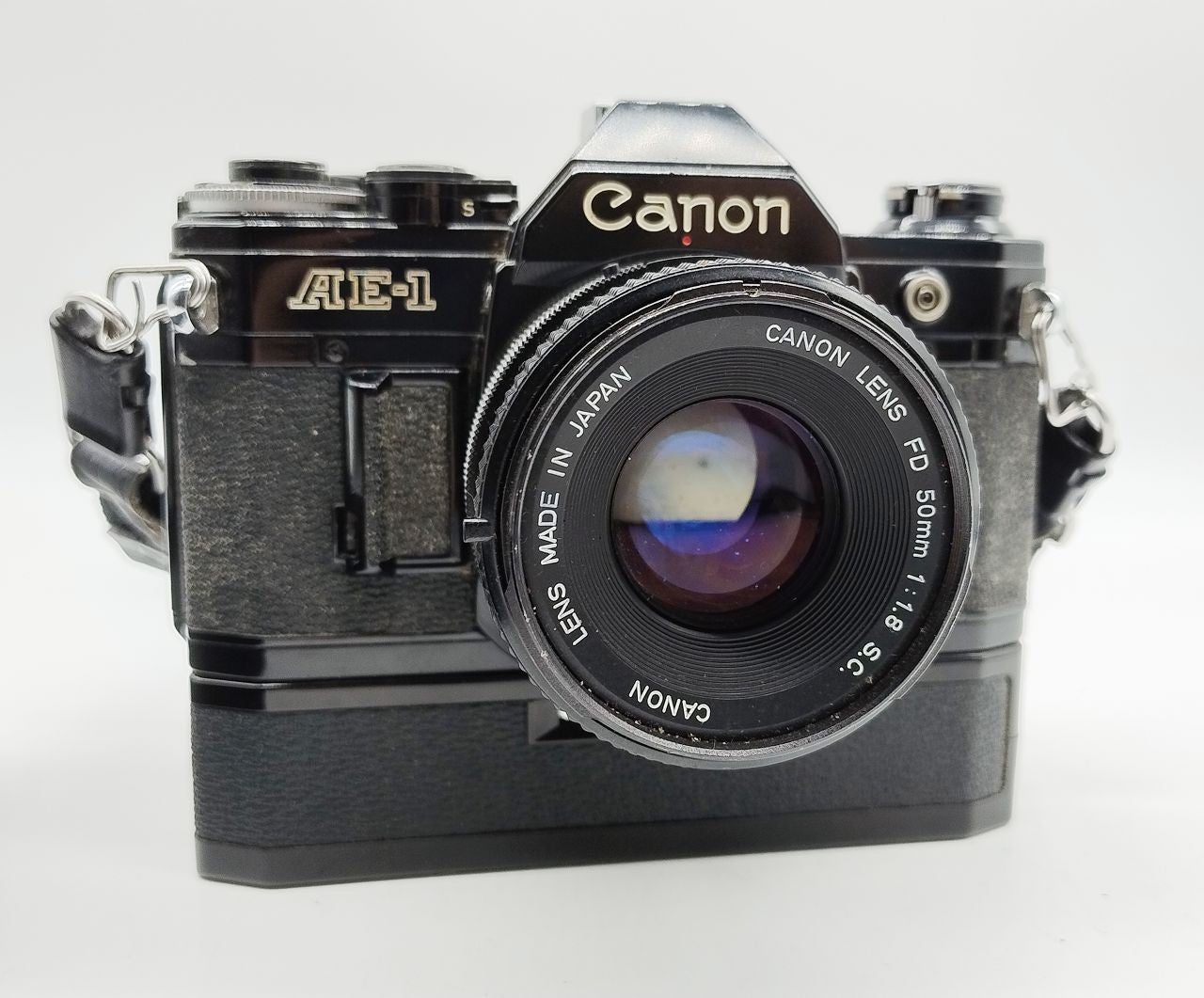 194 - Canon AE1 (schwarz) + FD 50/1.8 + Motor + alles voll funktionsfähig