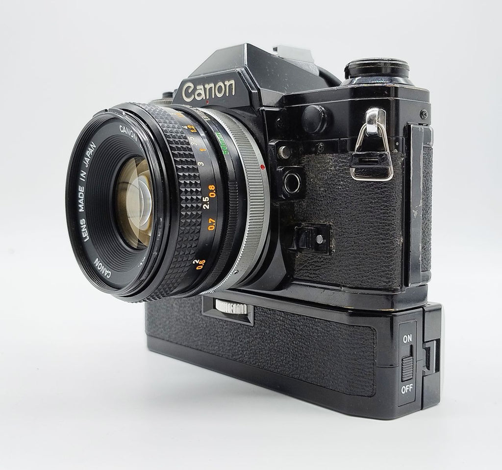 79 - Canon AE1 + Canon 50/1.8 Objektiv (vmtl. Pilz) + Motor Drive A