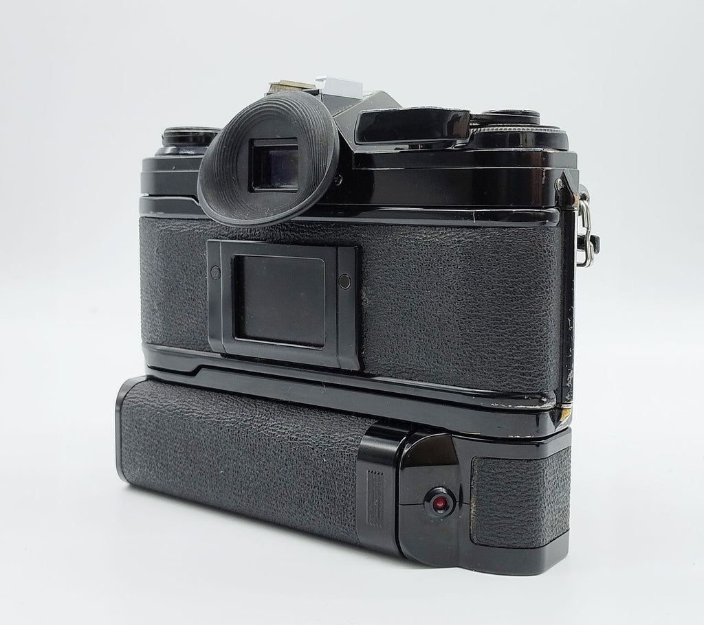 79 - Canon AE1 + Canon 50/1.8 Objektiv (vmtl. Pilz) + Motor Drive A