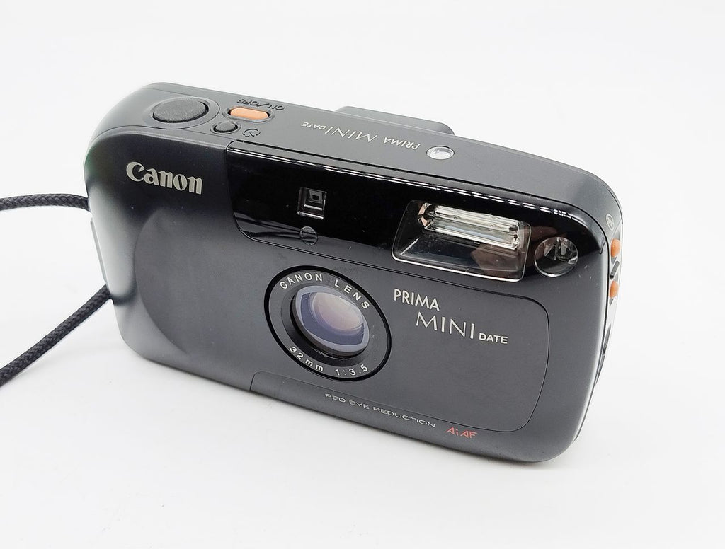 246 - Canon Prima Mini Date + 32/3.5 Objektiv + OVP & Ledertasche