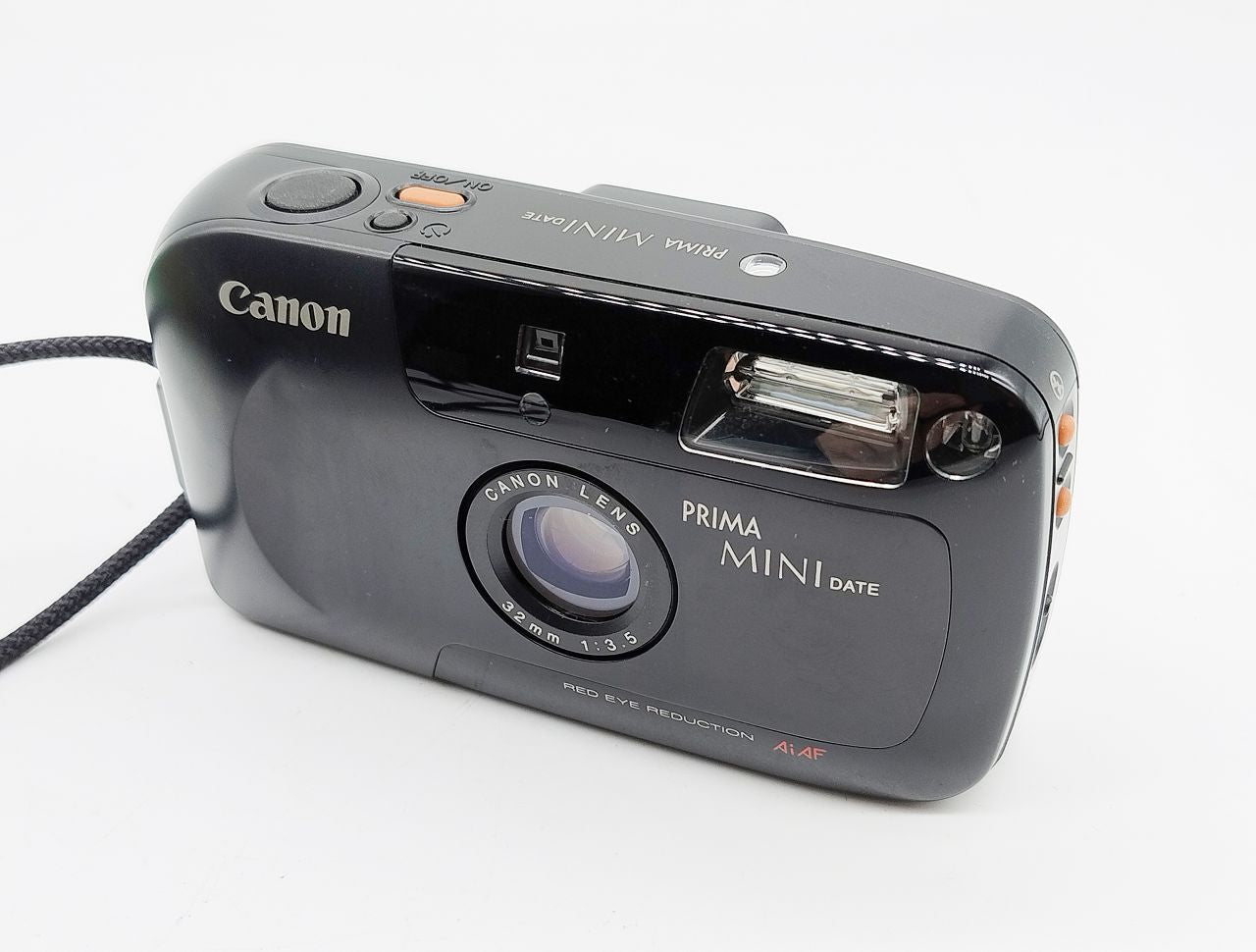 246 - Canon Prima Mini Date + 32/3.5 Objektiv + OVP & Ledertasche