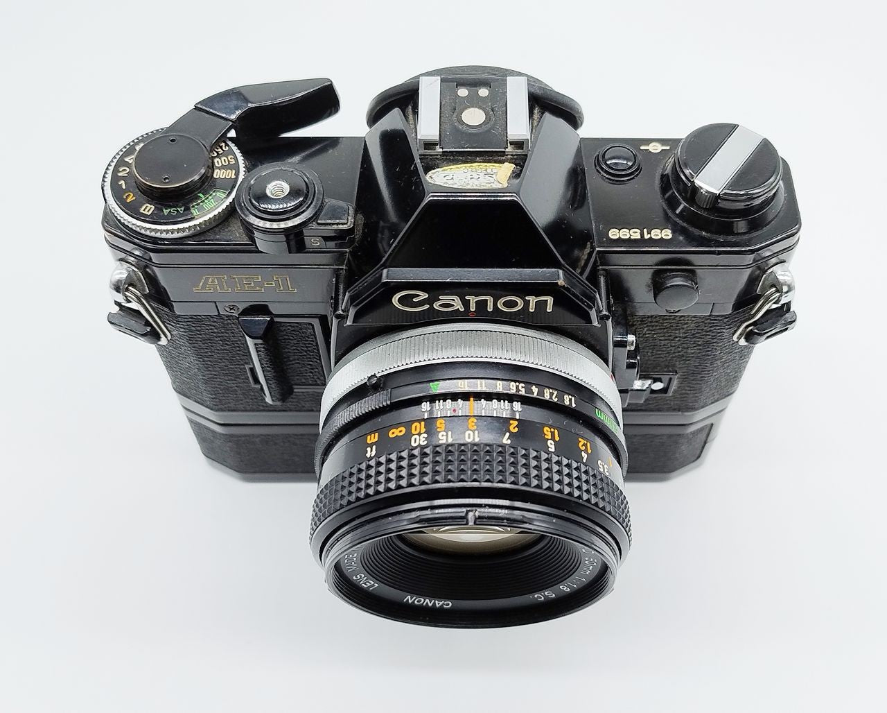 79 - Canon AE1 + Canon 50/1.8 Objektiv (vmtl. Pilz) + Motor Drive A