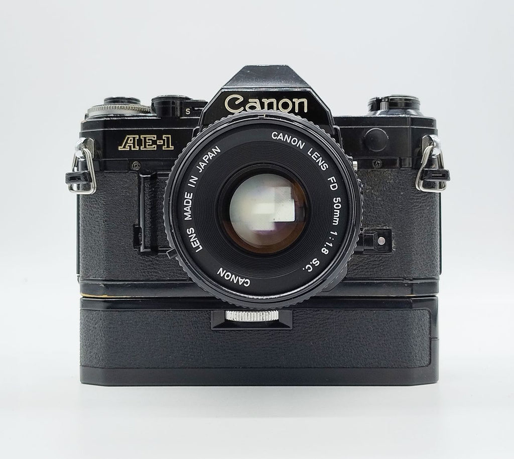 79 - Canon AE1 + Canon 50/1.8 Objektiv (vmtl. Pilz) + Motor Drive A