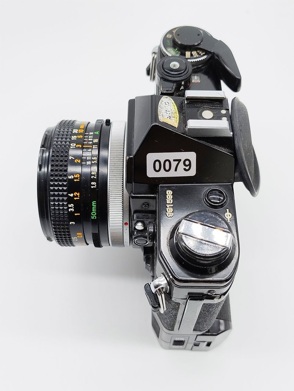 79 - Canon AE1 + Canon 50/1.8 Objektiv (vmtl. Pilz) + Motor Drive A