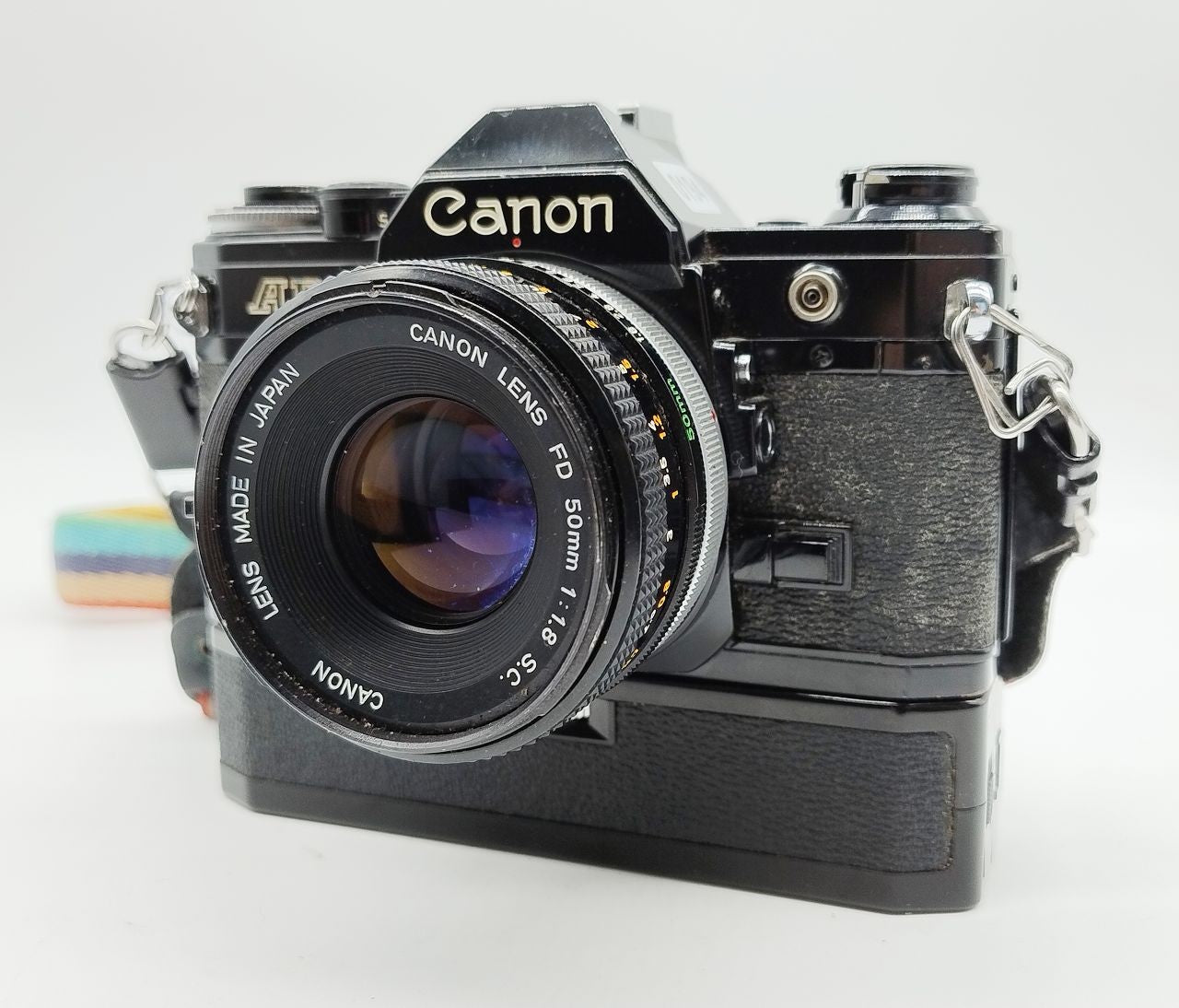 194 - Canon AE1 (schwarz) + FD 50/1.8 + Motor + alles voll funktionsfähig