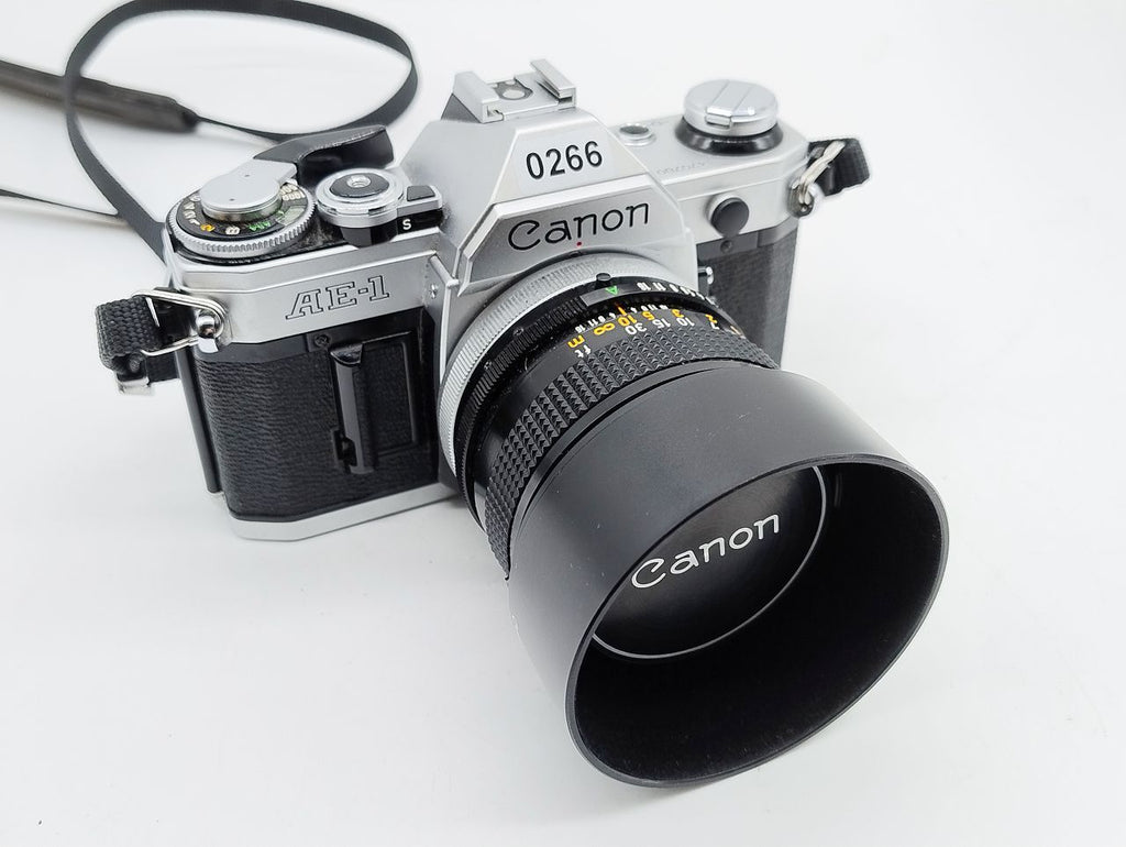 266 - Canon AE1 (läuft) + 50/1.4 FD (sehr schön +  Filter) + Karton + Anleitung